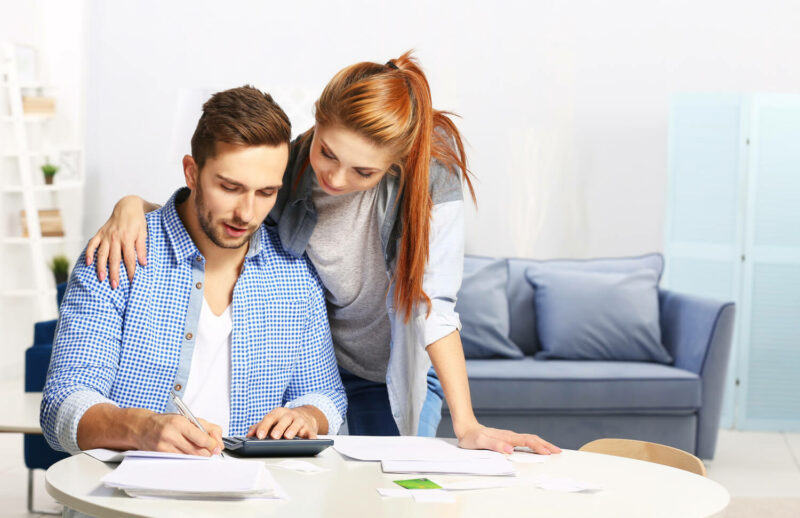 Couple looking at their property tax bill in Texas