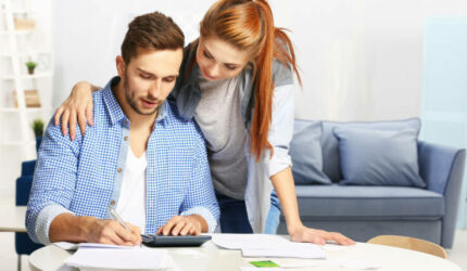 Couple looking at their property tax bill in Texas