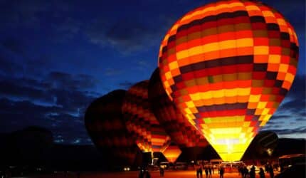 Plano hot air balloon festival lights up the evening sky