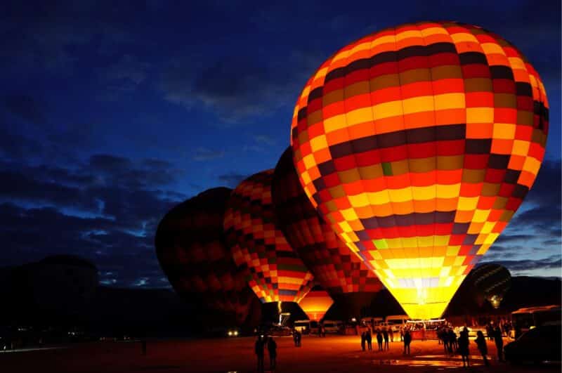 Plano hot air balloon festival lights up the evening sky