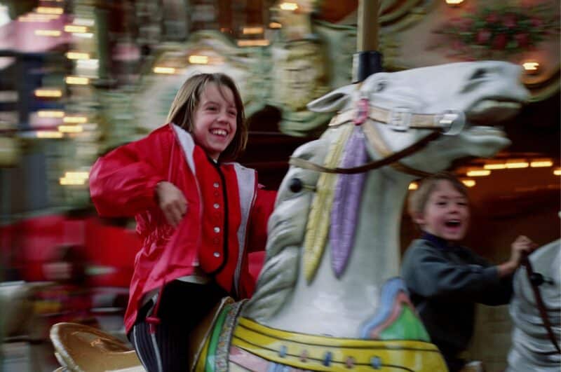 State Fair of Texas 2024 girl on a merry-go-round