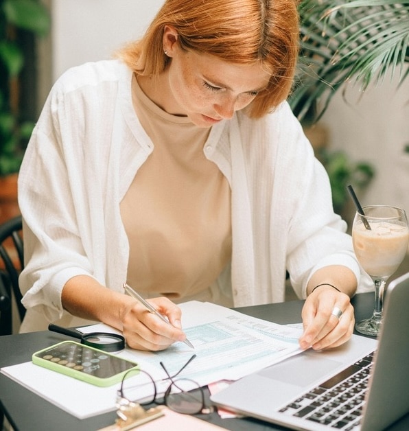 lady working on finances for mortgage loan